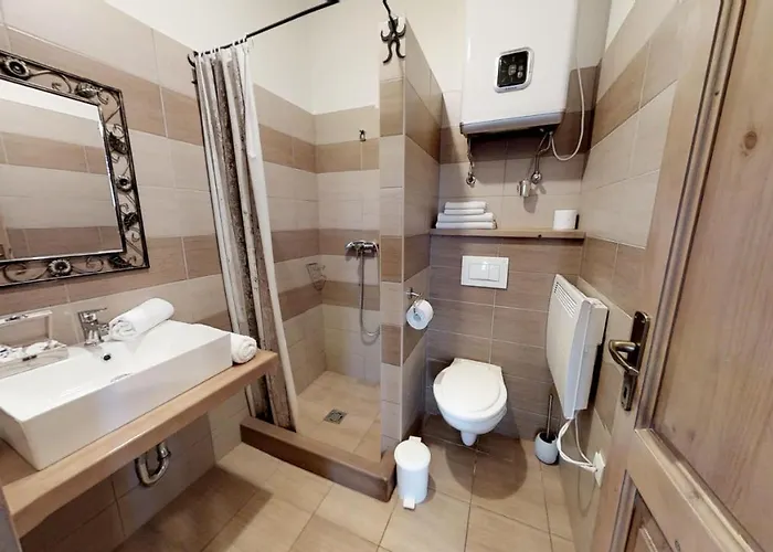 Гостевой дом Toth Vendeghaz Es Apartmanhaz Ujfeherto